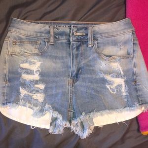 American Eagle faded blue shorts.